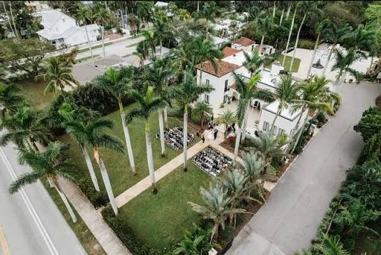 Alderman House wedding venue — historic white estate framed by royal palms in Ft. Myers, Florida