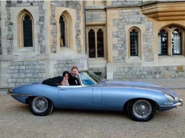 Prince Harry and Meghan Markle Jaguar E-Type Wedding Car Prince Harry and Meghan Markle driving away in the silver-blue 1968 Jaguar E-Type Concept Zero wedding car