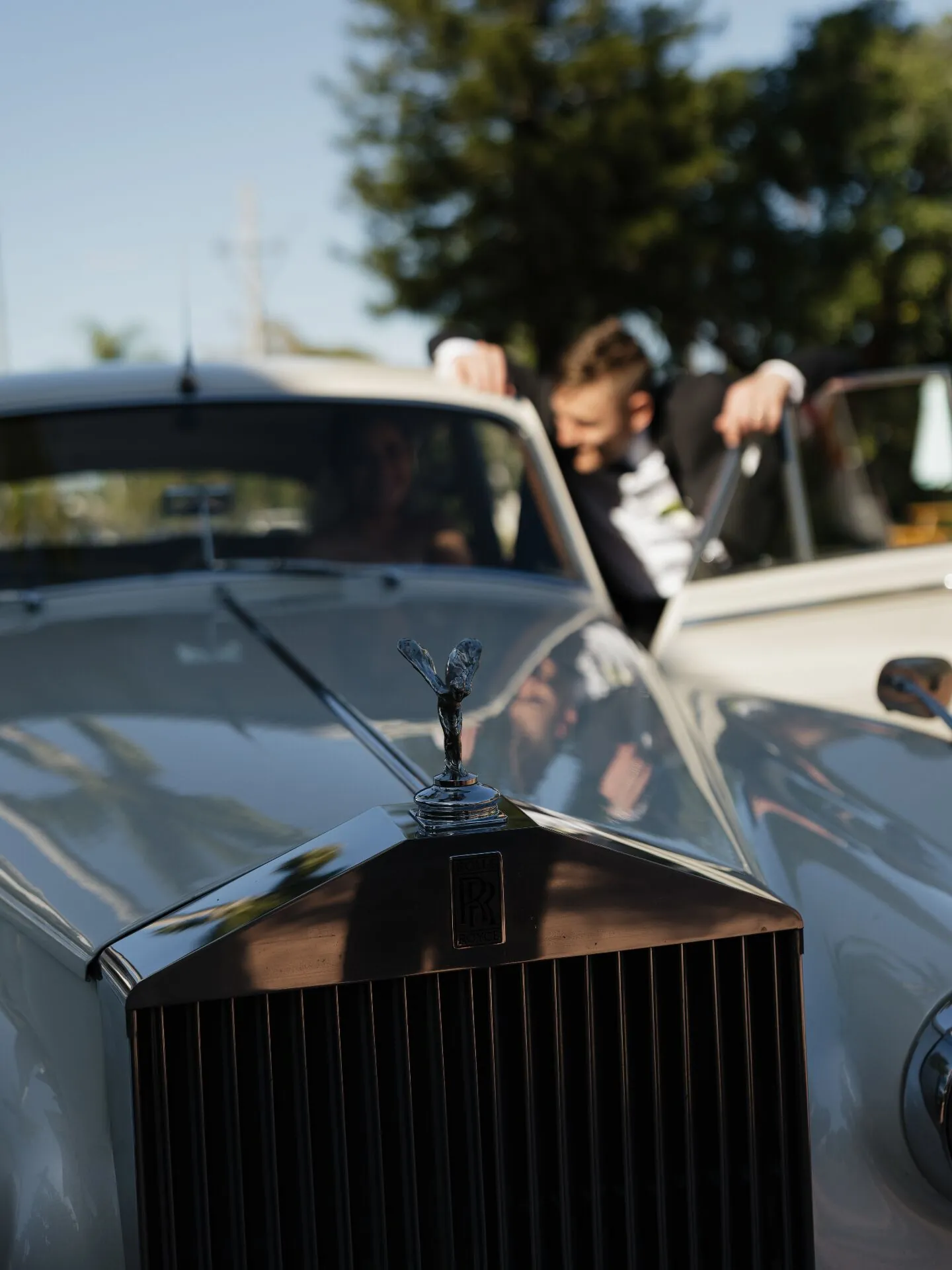 Spirit of Ecstasy hood ornament on vintage Rolls-Royce wedding car in Southwest Florida